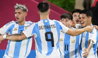 Argentina reach the World Cup knockout stage with a massive seven-goal victory.