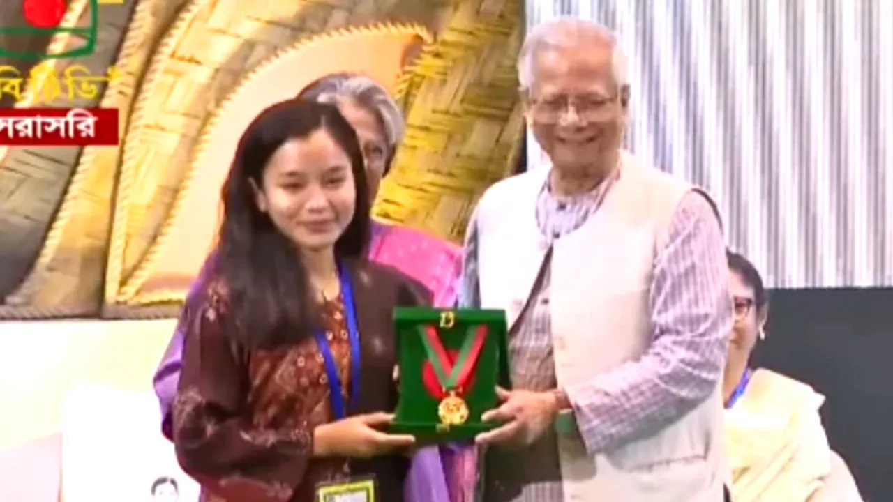 Ritu Parna Chakma receive award from Chief Advisor